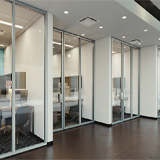 Wall to WELL: Designing with Glass Wall Systems to Create Flexible Spaces and Aesthetic Consistency